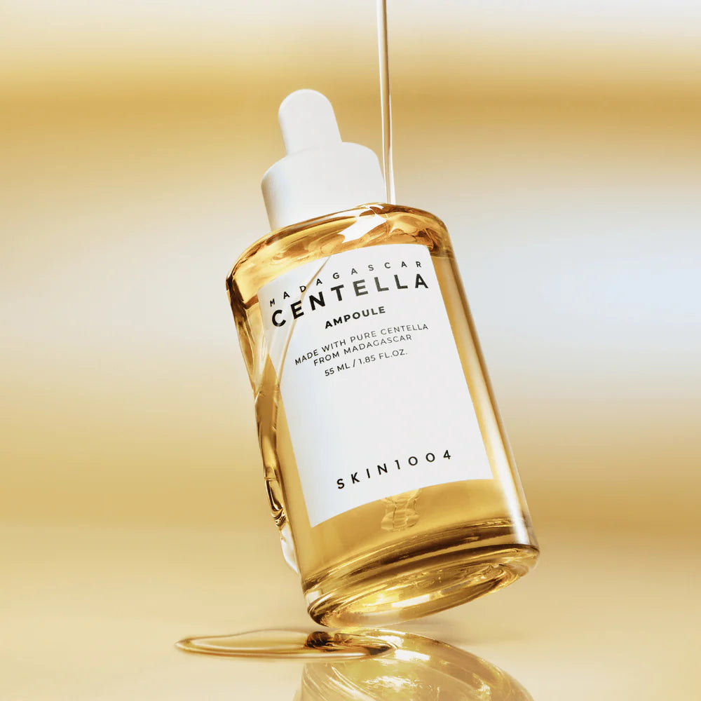 SKIN1004 Madagascar Centella Asiatica Ampoule 55ml – goldfarbene Pipettenflasche vor hellem, neutralem Hintergrund