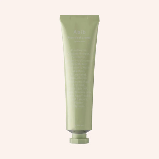 Abib Heartleaf Creme 75ml – weiße Tube mit Etikett auf schwarzem Hintergrund