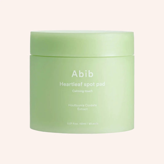 Abib Heartleaf Spot Pad Calming Touch 150ml/80 Stk. – hellgrüner Pad-Tiegel aufrecht auf weißem Grund