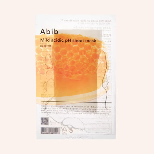 Abib Mild Acidic pH Sheet Mask Honey Fit 30ml – gelbe Tuchmaske mit Wabenmuster hinter dem Beutel