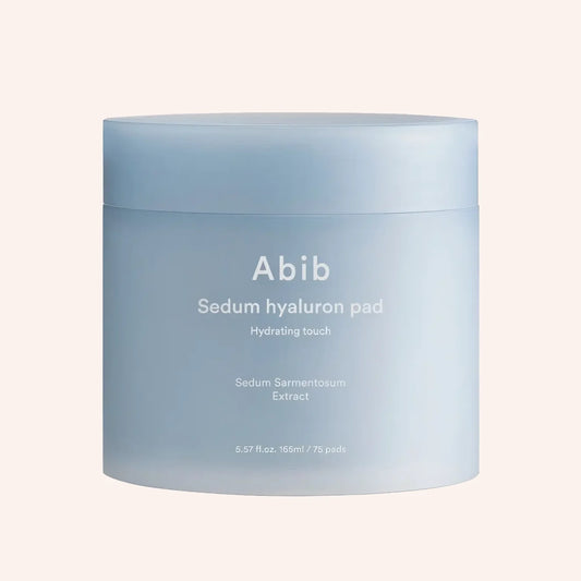 Abib Sedum Hyaluron Pad Hydrating Touch 165ml/75Stk. – blauer Pad-Tiegel auf blauem Hintergrund