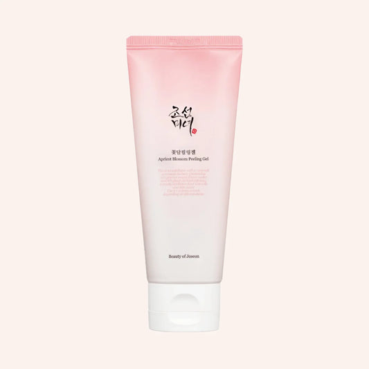 Beauty of Joseon Apricot Blossom Peeling Gel 100ml – Tube mit rosafarbener unterer Hälfte, aufrecht vor Schwarz