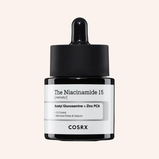 COSRX The Niacinamide 15 Serum 20ml – zylindrische Flasche mit weißem Etikett und großer schwarzer Schrift auf Schwarz