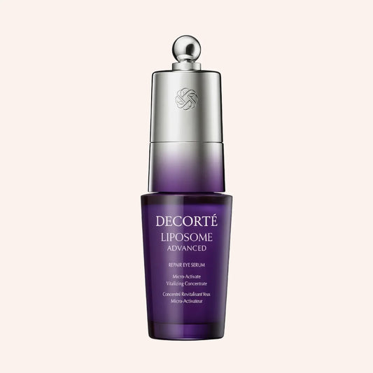 DECORTE Liposome Advanced Repair Eye Serum 20ml – weiße zylindrische Tube mit lila Kappe vor tiefviolettem Hintergrund