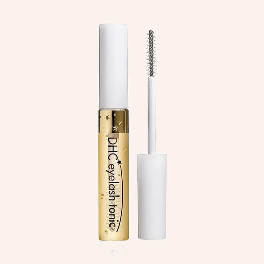 DHC Eyelash tonic  6,5ml – weiße Tube mit danebenliegendem Bürstchen-Applikator