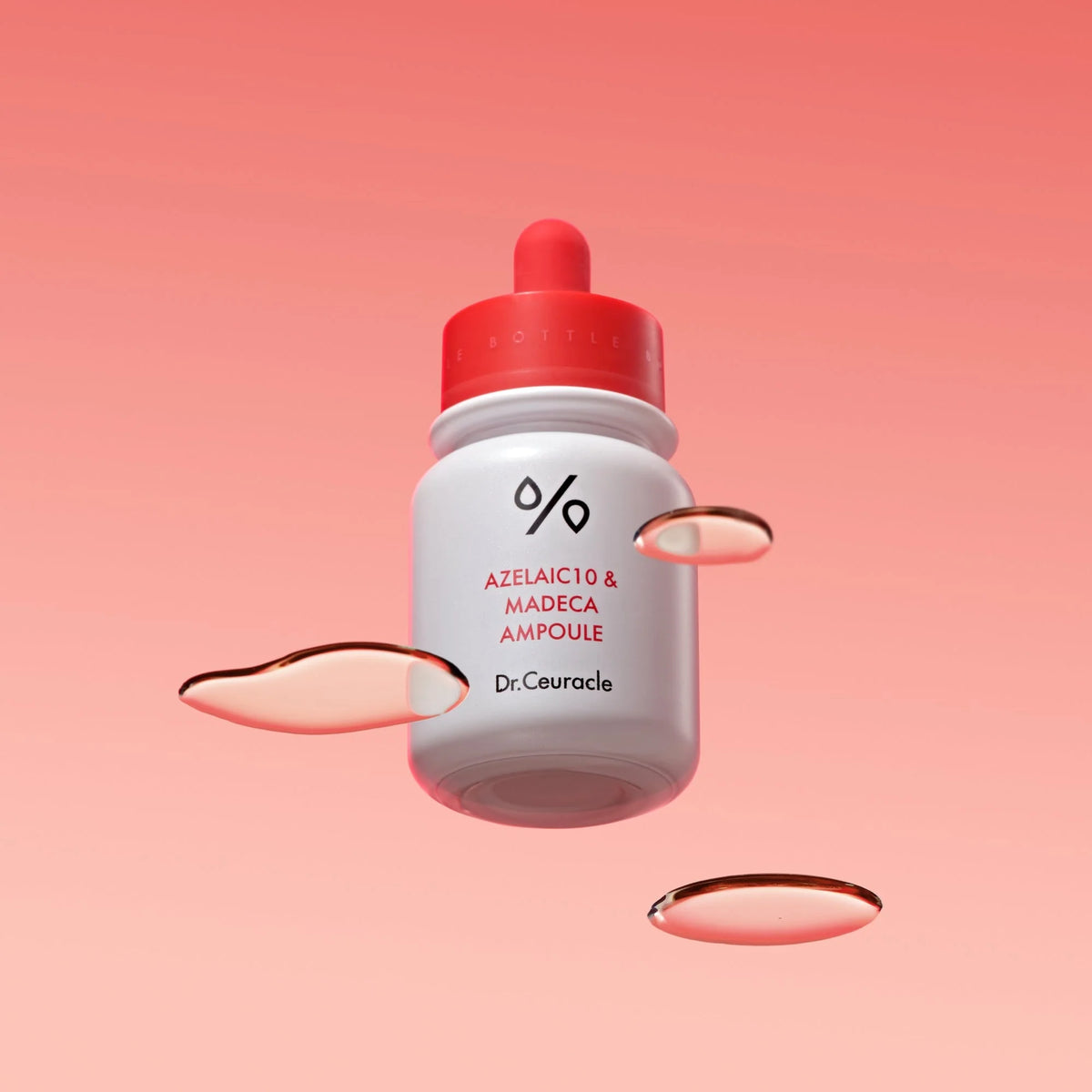 Dr. Ceuracle Azelaic 10 & Madeca Ampoule 30ml – Flasche mit rotem Deckel vor rosa Verlauf