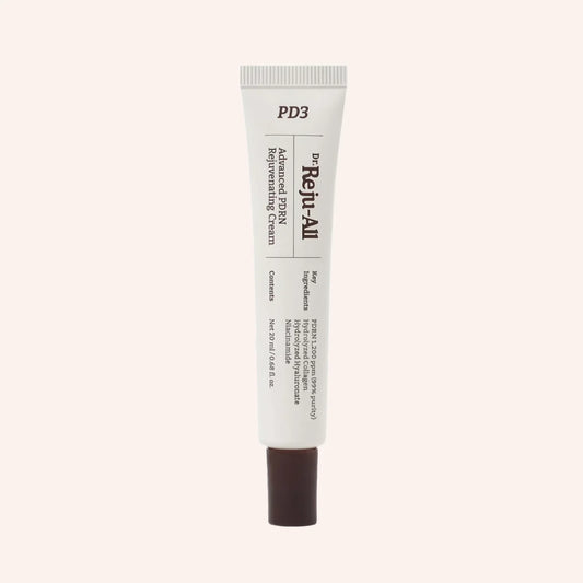 Dr. Reju-All Advanced PDRN Rejuvenating Cream 20ml – weiße Tube mit schwarzer Schrift vor grünen Blättern