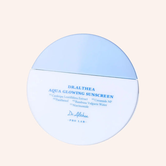 Dr. Althea Pro Lab Aqua Glowing Sunscreen SPF50+ PA++++ 45ml – Zylindrische Tube vor schwarzem Hintergrund