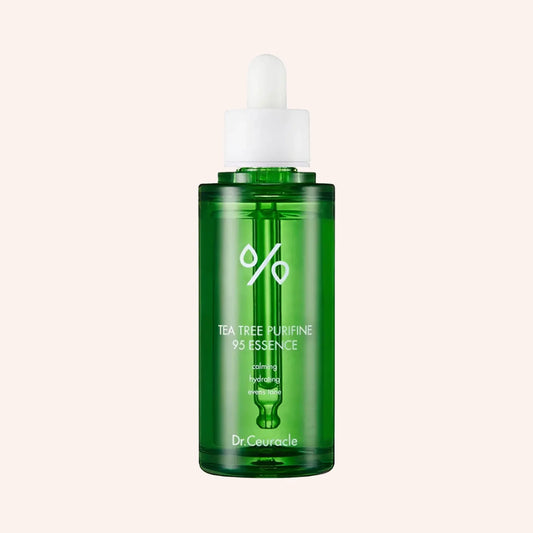 Dr. Ceuracle Tea Tree Purifine Essence 50ml – Pipettenflasche vor dunklem Hintergrund mit Blättern