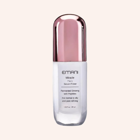 EMANI Miracle 7in1 serum 35 ml – Weiße Pipettenflasche mit rosa Deckel auf rosa Hintergrund