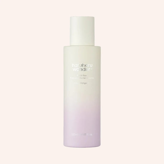 Haruharu Wonder Black Rice Probiotics Barrier Essence alias Makgeolli 120ml – Flasche mit klarem Inhalt vor schwarzem Grund