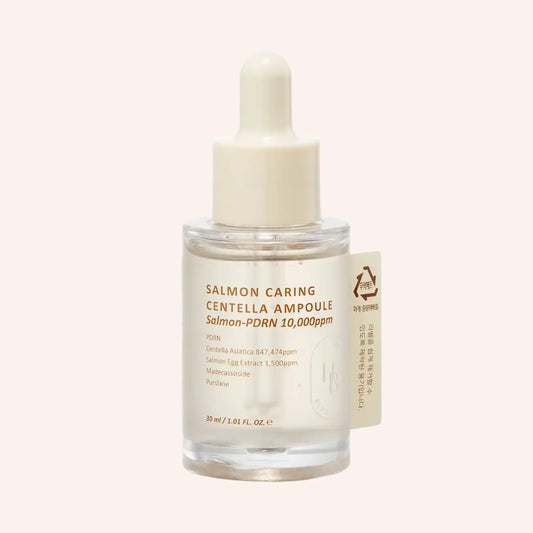 Heveblue Salmon Caring Centella Ampulle 30ml – Flasche mit weißem Etikett vor Dunkel