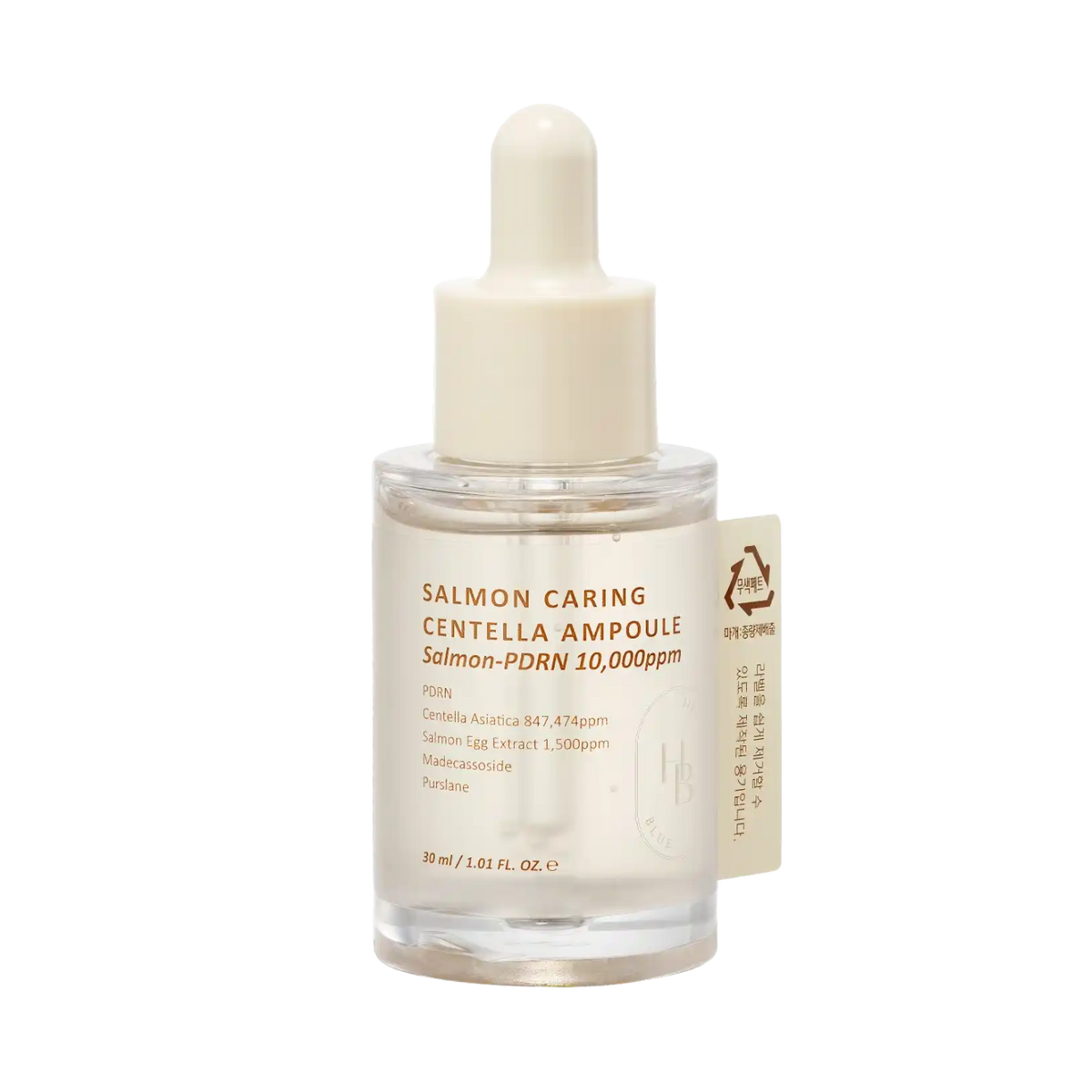 Heveblue Salmon Caring Centella Ampulle 30ml – Flasche mit weißem Etikett vor Dunkel