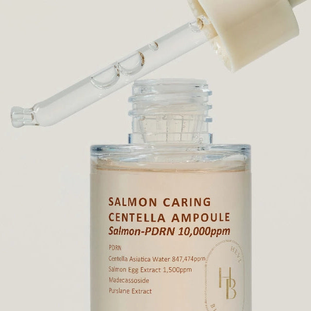 Heveblue Salmon Caring Centella Ampulle 30ml – Glas-Pipettenflasche mit gelblichem Inhalt und Metalldeckel