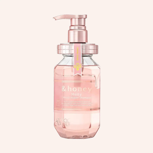 &honey Melty Moist Repair Shampoo 1.0 440ml – Klare Pumpflasche mit rosa Inhalt und metallischem Roségold-Effekt