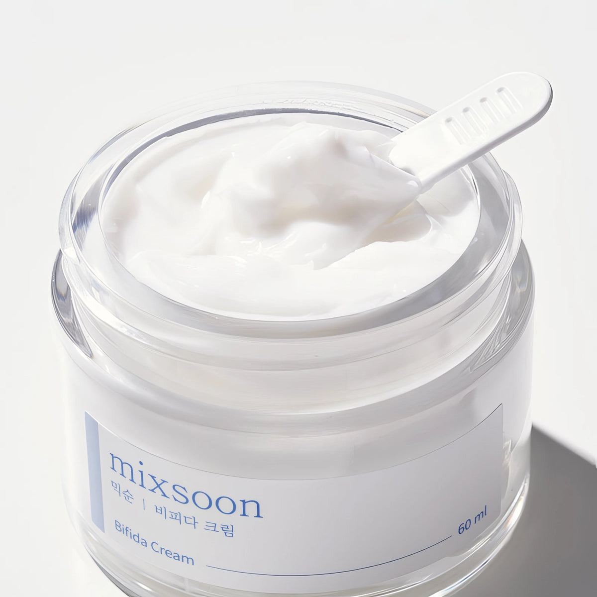 Mixsoon Bifida Creme 60ml – klarer Tiegel mit Creme auf blauem Grund