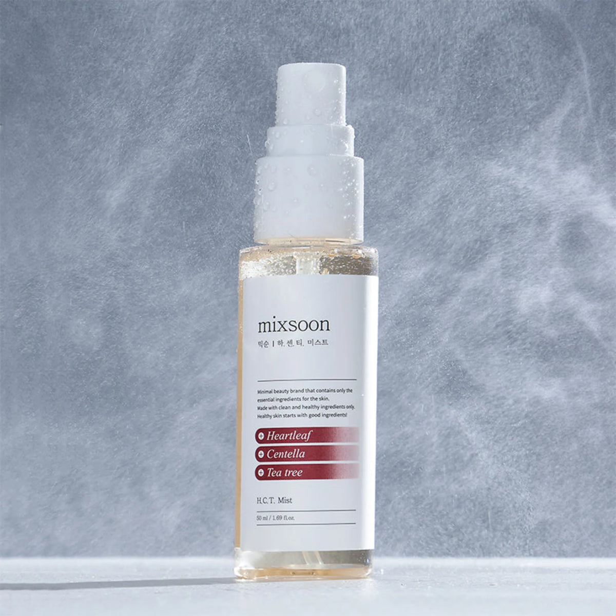Mixsoon H.C.T Mist 50ml – klare Flasche mit Pipette und weißem Etikett in Rot und Blau vor Blau
