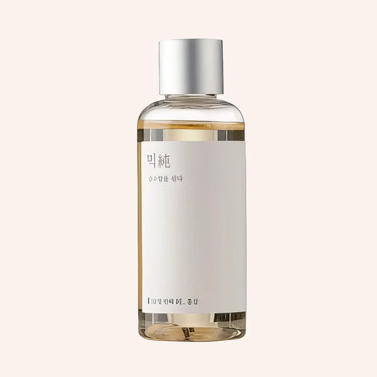 Mixsoon Panax Ginseng Root Essence 100ml – klare Pumpflasche mit umlaufendem Etikett vor schwarzem Hintergrund