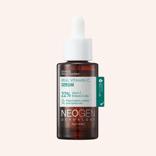 Neogen Dermalogy Real Vitamin C Serum 32ml – dunkle Glasflasche mit Pipette und grünem Etikett vor dunklem Grund