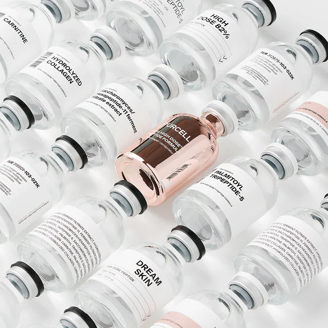 Purcell 82% High Dose Peptide Formula 30ml – mehrere rosa Pipettenflaschen im Raster auf Weiß