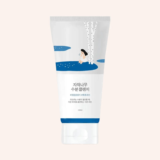 Round Lab Birch Juice Cleanser 150ml – weiße Tube mit blauen und schwarzen Akzenten, Tropfensymbol, vor Schwarz
