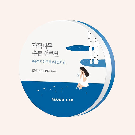 Round Lab Birch Juice Moisturizing Sun Cushion SPF 50+ PA++++, 15g – rundes blaues Döschen mit weißer Silhouette im Wasser
