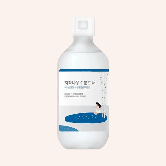Round Lab Birch Juice Toner 300ml – Flasche mit blauem Etikett und weißem Wellenmuster auf Blau