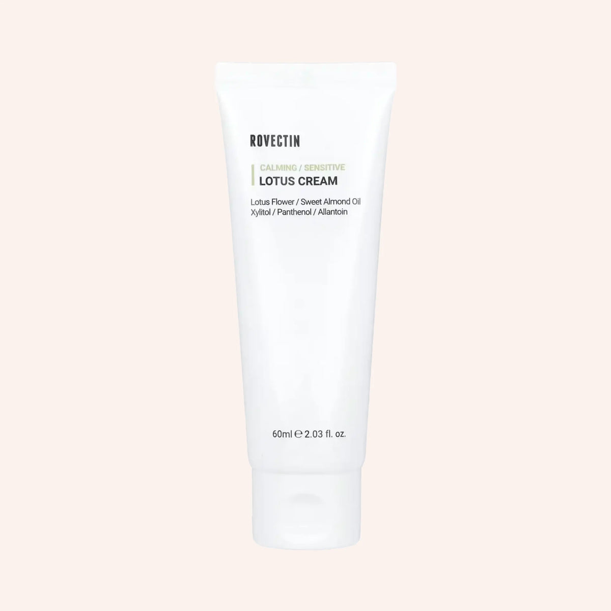 Rovectin Calming Lotus Cream 60ml – weiße Tube aufrecht vor dunklem, strukturiertem Hintergrund
