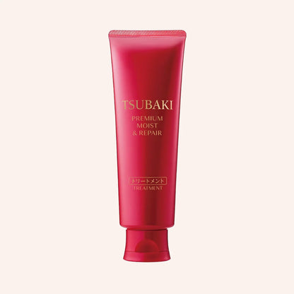 Shiseido Tsubaki Premium Moist & Repair Treatment 160g – rot-weiße Tube vor dunklem Grund