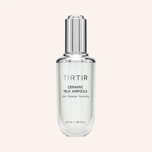 TIRTIR Ceramic Milk Ampoule 30ml – weiße Flasche mit Silberkappe vor schwarzem Grund