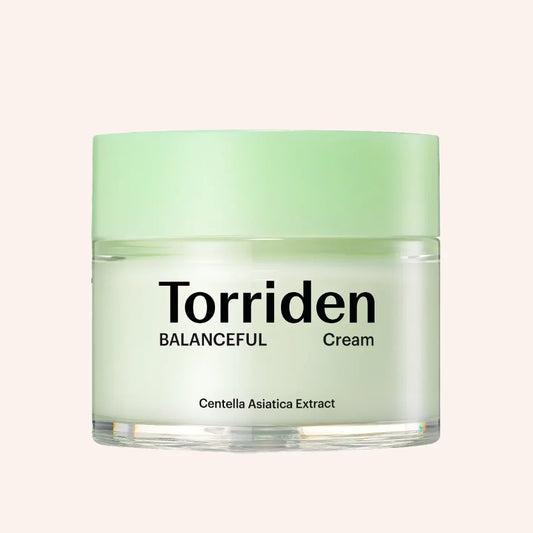 Torriden Balanceful Cica Cream 80ml – grüner Tiegel mit weißem Deckel zwischen Blättern