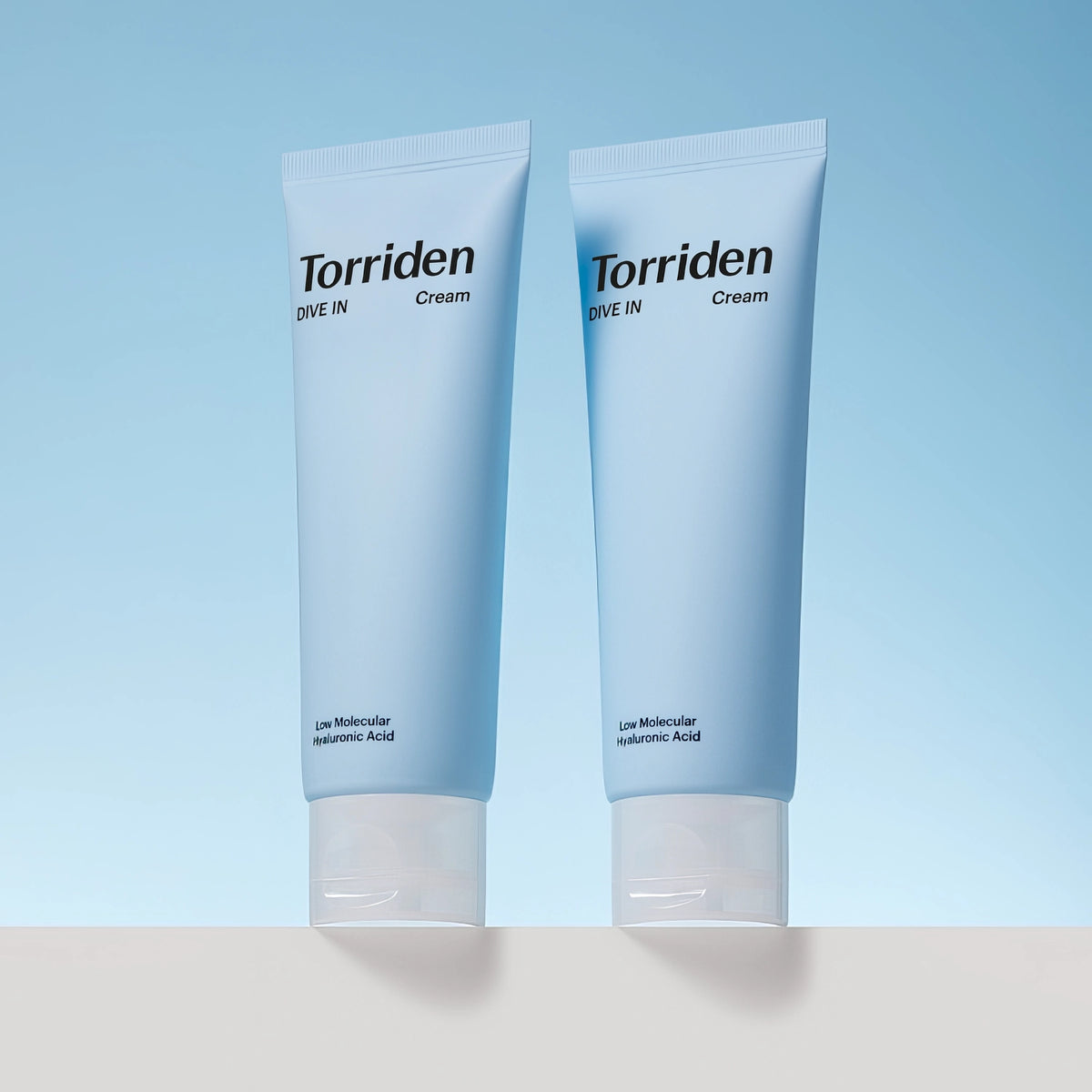 Torriden DIVE-IN Low Molecular Hyaluronic Acid Cream 80ml – zwei Tuben nebeneinander auf Blau